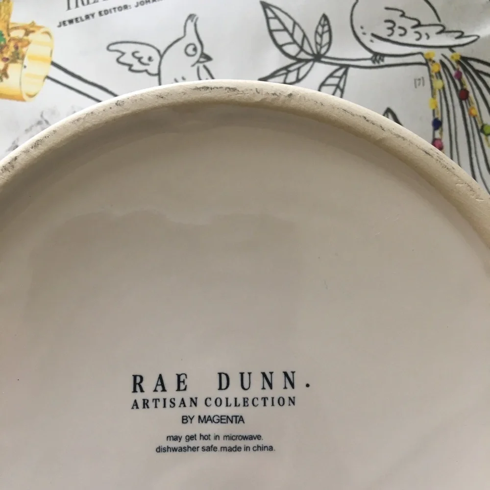 Rae Dunn dog food bowl etched with “Chow down”